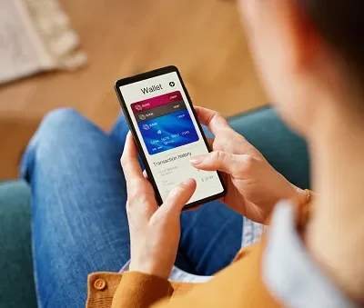 latin hispanic woman checking digital wallet on smartphone